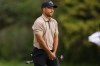 Xander Schauffele reacts to missing a Par putt on the 13th green during the final round of the Genesis Invitational golf tournament at Riviera Country Club, Sunday, Feb. 18, 2024, in the Pacific Palisades area of, Los Angeles. (AP Photo/Ryan Kang)