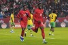 Canada's Alphonso Davies (19) celebrates scoring his team's opening goal against Jamaica with Jonathan David (20) during first half CONCACAF Nations League quarterfinal action in Toronto, on Tuesday, November 21, 2023. Canada will play the sixth-ranked Netherlands in a men's soccer friendly in June in Rotterdam. THE CANADIAN PRESS/Chris Young