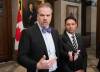 Adrian Wyld / Canadian Press
                                Minister of Justice and Attorney General of Canada Arif Virani, right, looks on as Health Minister Mark Holland speaks about medical assistance in dying (MAID) legislation on Feb. 1 in Ottawa.
