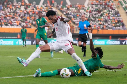 SUNDAY ALAMBA / THE ASSOCIATED PRESS
                                Cape Verde’s Ryan Mendes (left) is tackled by Mauritania’s Ibrahima Keita during an African Cup of Nations round of 16 match in Abidjan, Ivory Coast.