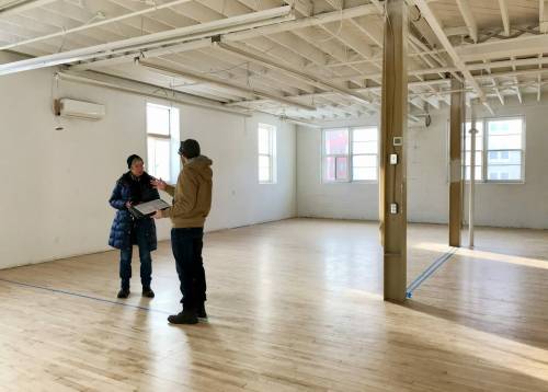 SUPPLIED
                                Shawna Dempsey (left) speaks to a contractor at MAWA&rsquo;s new space on Cumberland Avenue.