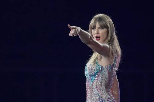 PHOTO / TORU HANAI / THE ASSOCIATED PRESS
                                Whether or not they look real, AI images of Taylor Swift, above in a real photo in Tokyo on Feb. 7, or Winnipeg high school students, they exist and the harm they do is also very real.
