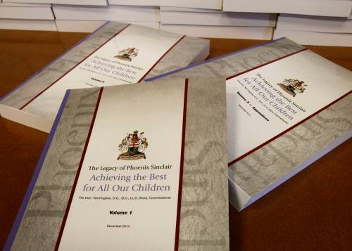 The three volumes of The Legacy of Phoenix Sinclair, Achieving the Best for All Our Children report by The Hon. Ted Hughes. Wayne Glowacki / Winnipeg Free Press Jan.31 2014