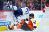 Matt Slocum / The Associated Press
                                Jets captain Adam Lowry and Marc Staal of the Flyers collide during first-period action Thursday night in Philadelphia, Pa.