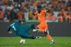 SUNDAY ALAMBA / THE ASSOCIATED PRESS
                                Ivory Coast’s Jonathan Bamba scampers around DR Congo goalkeeper Lionel Mpasi during an African Cup of Nations semifinal match on Wednesday.