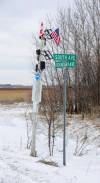 RUTH BONNEVILLE / WINNIPEG FREE PRESS
                                Local - RCMP border ride-along Weathered post with Canada and US Flags with monitors attached to it at the corner of South Ave and Boundary Ave. In Emerson. This is a border site where people cross into Canada. Photo one of the old border crossing which is one of the areas people are caught crossing the border. NoyesЅmerson East Border Crossing CanadaЕnited States port of entry that formerly connected the communities of Noyes, Minnesota, and Emerson, Manitoba has been closed since 2006 but still monitored by both the US and Canada Border Patrol. See US helicopter flying over. Story: Cpl. James Buhler takes FP reporter and photographer on drive to the areas near Emerson MB. where people tend to illegally cross into Canada from the US. See story by Chris Feb 13th, 2024