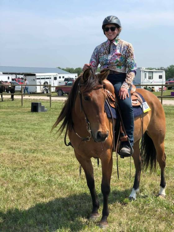 Seeing young people connect with horses is meaningful for Carol Stansfield, 61, who is a volunteer at Stonewall's Urban Stable. (Supplied)