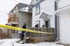 Police outside the scene at 259 Magnus Ave. on Wednesday. (Mike Deal / Free Press files)