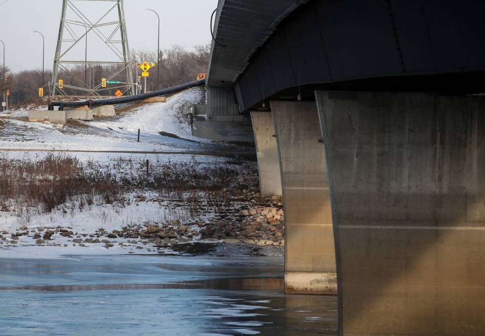 JOHN WOODS / FREE PRESS
                                A 90 centimetre-wide pipe, which runs under the Red River near the Fort Garry Bridge, failed on Feb. 7 and has released 221.2 megalitres of sewage into the river.