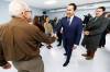 MIKE DEAL / FREE PRESS Community member, Darryl Speer, shakes Premier Wab Kinew’s hand after the announcement. Premier Wab Kinew and Environment and Climate Change Minister Tracy Schmidt announce during a visit to the Anola Community Club Friday morning, that the Manitoba government has decided to not issue an environmental licence for the Vivian sand extraction project in the Rural Municipality of Springfield. 240216 - Friday, February 16, 2024.