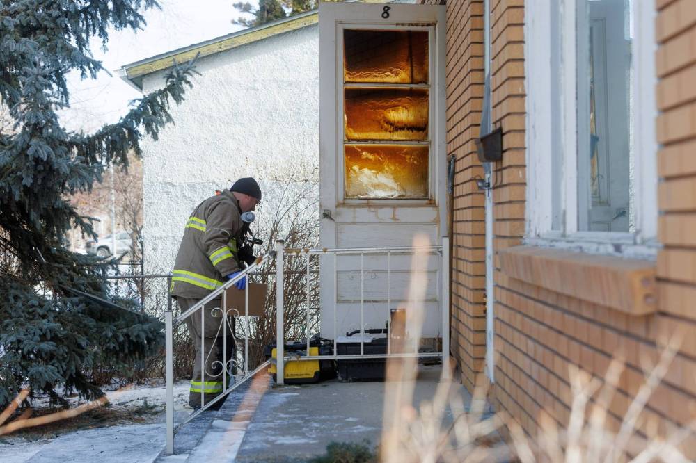 A person was found dead in the aftermath of a fire on Vivian Avenue on Wednesday. (MIKE DEAL / FREE PRESS)