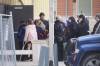 RUTH BONNEVILLE / FREE PRESS
                                A slow procession of people make their way into the funeral service for Amanda Clearwater, Bethany, Jayven, Isabella Manoakeesick and Myah-lee Gratton at the Carman Community Hall, Wednesday morning.