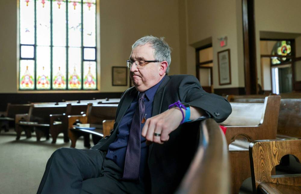 RUTH BONNEVILLE / FREE PRESS
Rev. Harold Kenyon of Carman United Church shares his thoughts after attending the funeral for Amanda Clearwater, Bethany, Jayven, Isabella Manoakeesick and Myah-lee Gratton, Wednesday afternoon.