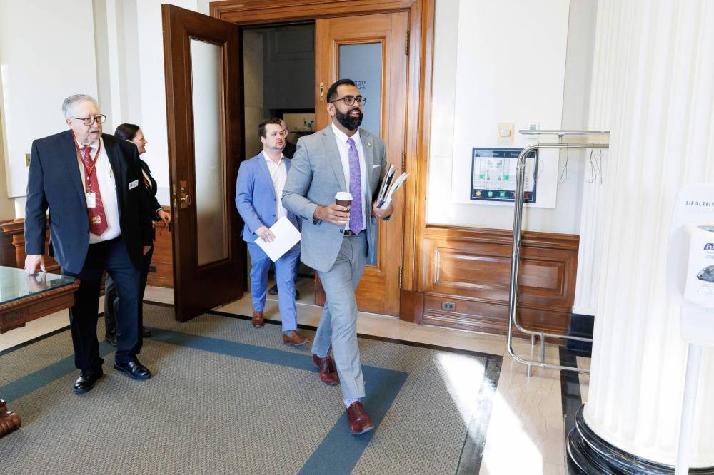 MIKE DEAL / FREE PRESS
PC finance critic Obby Khan (right) repeatedly described the dismissal as suspicious, stating the board ought to have conducted a formal performance review before firing Grewal.