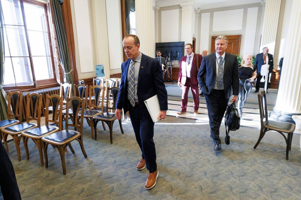 MIKE DEAL / FREE PRESS
Manitoba Hydro’s interim CEO Hal Turner (left) and Hydro board chair Ben Graham (right) at the committee meeting Thursday morning. Graham said the decision to let Grewal go followed very strong, confidential discussions by the new board.