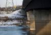 JOHN WOODS / FREE PRESS FILES
                                City crews work to bypass a sewage leak across the Red River at the Fort Garry Bridge on Tuesday.