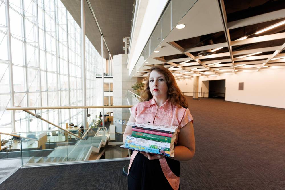 MIKE DEAL / FREE PRESS
Samantha Beiko, artistic director of the Prairie Comics Festival, in the Millennium Library where she is hoping to stage a festival in the fall.