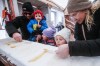 JOHN WOODS / FREE PRESS
Taylor and Kayla roll maple syrup with their children, from left, Cooper, Maci, and Allie in the Sugar Shack at the Festival Du Voyageur Sunday, February 18, 2024. 

Reporter: Nicole