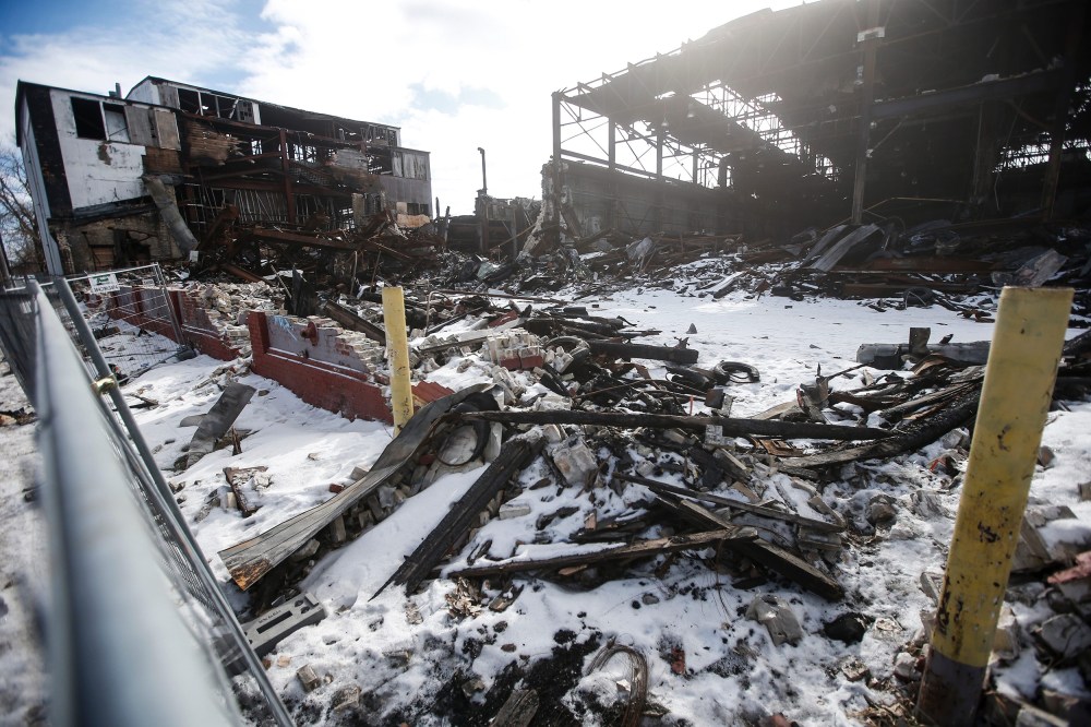 The former Vulcan Iron Works building burned again Saturday evening, the latest blaze at the site which was originally destroyed by fire in July 2023. (John Woods / Free Press)