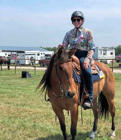 Seeing young people connect with horses is meaningful for Carol Stansfield, 61, who is a volunteer at Stonewall&rsquo;s Urban Stable. (Supplied)