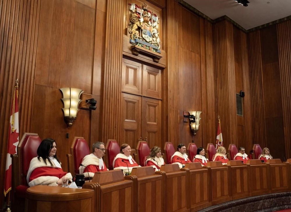 The Supreme Court of Canada has affirmed the standards that appeal courts have long used to review trial judgments, saying they promote the fair assessment of testimony. Supreme Court of Canada Justice Michelle O'Bonsawin, left to right, Justice Nicholas Kasirer, Justice Malcolm Rowe, Justice Andromache Karakatsanis, Chief Justice Richard Wagner, Justice Suzanne Cote, Justice Sheilah Martin, Justice Mahmud Jamal and
Justice Mary Moreau are seen during a welcome ceremony at the Supreme Court, in Ottawa, Monday, Feb. 19, 2024. THE CANADIAN PRESS/Adrian Wyld