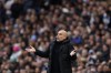 Manchester City's head coach Pep Guardiola reacts during an English Premier League soccer match between Manchester City and Manchester United at the Etihad Stadium in Manchester, England, Sunday, March 3, 2024. (AP Photo/Dave Thompson)
