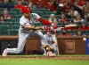 FILE - Cincinnati Reds' Noelvi Marté hits a single during the eighth inning of a baseball game against the St. Louis Cardinals, Sept. 29, 2023, in St. Louis. Marté, a 22-year-old infielder who is the Reds top prospect, was suspended for the first 80 games of the season Friday, March 8, 2024, following a positive test under Major League Baseball's drug program. (AP Photo/Scott Kane, File)