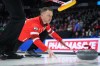 Defending champion Brad Gushue and Alberta's Brendan Bottcher won their opening playoff games at the Canadian men's curling championship Friday to shorten theirs roads to the final. Gushue delivers a rock while playing Team Manitoba-Carruthers during the playoffs at the Brier in Regina, Friday, March 8, 2024. THE CANADIAN PRESS/Darryl Dyck