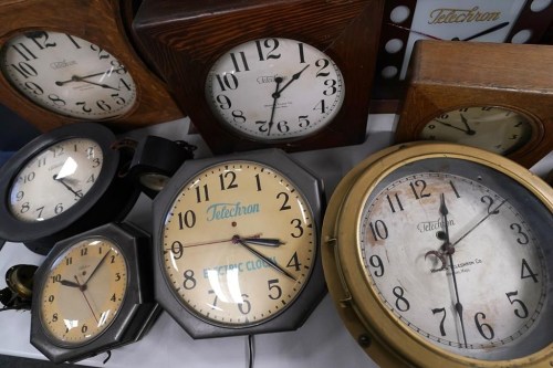 A selection of vintage clocks are displayed at Electric Time Company, Tuesday, Nov. 1, 2022, in Medfield, Mass. Daylight saving time ends at 2 a.m. local time Sunday, Nov. 6, 2022, when clocks are set back one hour. (AP Photo/Charles Krupa)