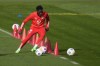 Canadian star Alphonso Davies' first start fter an injury layoff lasted just 14 minutes Saturday when he took a boot to the face in Bayern Munich's Bundesliga game against Mainz. Davies practices during a training session in Munich, Germany, Feb. 19, 2024. THE CANADIAN PRESS/AP-Matthias Schrader