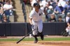 New York Yankees designated hitter Giancarlo Stanton hits a double in the second inning of a spring training baseball game against the Atlanta Braves Sunday, March 10, 2024, in Tampa, Fla. (AP Photo/Charlie Neibergall)