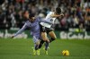Real Madrid's Brahim Diaz, left, and Valencia's Diego Lopez battle for the ball during the La Liga soccer match between Valencia and Real Madrid at the Mestalla Stadium in Valencia, Spain, Saturday, March 2, 2024. (AP Photo/Jose Breton)