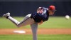 Atlanta Braves starting pitcher AJ Smith-Shawver throws during the first inning of a spring training baseball game against the New York Yankees Sunday, March 10, 2024, in Tampa, Fla. (AP Photo/Charlie Neibergall)