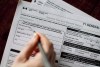 Taxes may well be a certainty of life, but they morph and multiply by the year, including some big changes this filing season. A T1 General 2010 tax form is pictured in Toronto on April 13, 2011. THE CANADIAN PRESS/Chris Young