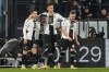 Udinese's Lorenzo Lucca celebrates with his teammates after scoring his side's first goal during a Serie A soccer match between Lazio and Udinese, at Rome's Olympic Stadium, Monday, March 11, 2024. (AP Photo/Andrew Medichini)