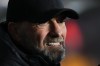 Liverpool's manager Jurgen Klopp waits in the dugout for play to start in the Europa League round of 16 first leg, soccer match between Sparta Praha and Liverpool at the Epet Arena in Prague, Czech Republic, Thursday, March 7, 2024. (AP Photo/Petr David Josek)