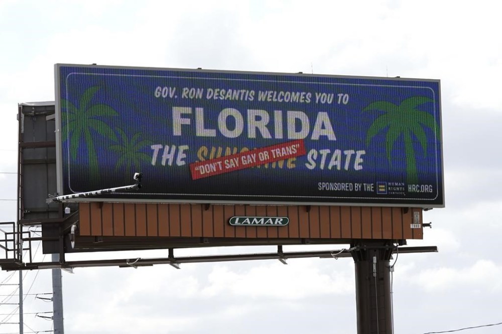 FILE - A new billboard welcoming visitors to