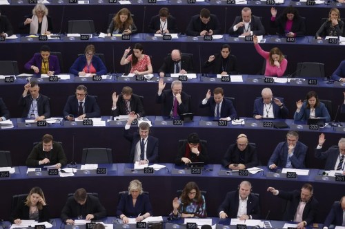 European Union lawmakers vote on an Artificial Intelligence Act at the European Parliament, Wednesday, March 13, 2024 in Strasbourg, eastern France. European Union lawmakers are set to give final approval to the 27-nation bloc's artificial intelligence law, putting the world-leading rules on track to take effect later this year. (AP Photo/Jean-Francois Badias)