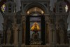 The original statue of the Virgin of Charity of El Cobre stands behind the altar at her shrine in El Cobre, Cuba, Sunday, Feb. 11, 2024. The Vatican-recognized Virgin, venerated by Catholics and followers of Afro-Cuban Santeria traditions, is at the heart of Cuban identity, uniting compatriots from the Communist-run Caribbean island to those who were exiled or emigrated to the U.S. (AP Photo/Ramon Espinosa)