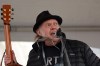 Rock legend Neil Young performs during a rally against the destruction of old growth forests in Victoria on Saturday, Feb. 25, 2023. Two years after the 