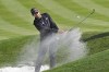Patrick Rodgers blasts from a sand trap along the second green during a practice round of The Players Championship golf tournament Wednesday, March 13, 2024, in Ponte Vedra Beach, Fla. (AP Photo/Chris O'Meara)