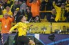 Dortmund's Jadon Sancho celebrates after scoring his side's opening goal during the Champions League round of 16 second leg soccer match between Borussia Dortmund and PSV Eindhoven at the Signal Iduna Park in Dortmund, Germany, Wednesday, March 13, 2024. (AP Photo/Martin Meissner)