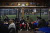 Amateur players have a rest in a tea room after playing a recreational soccer 