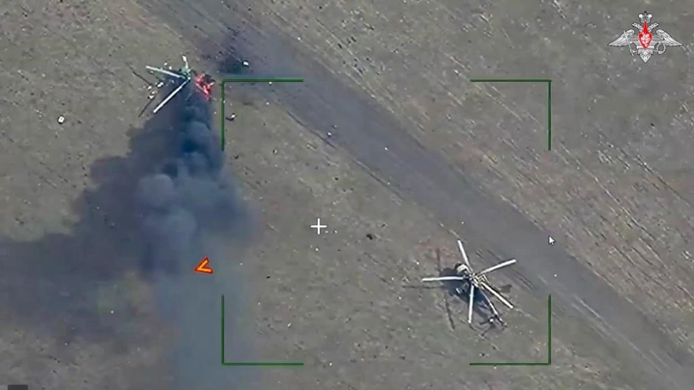 This photo taken from video released by Russian Defense Ministry Press Service on Wednesday, March 13, 2024, shows destruction of Ukrainian Armed Forces helicopters at the jump site at an undisclosed location in the Donetsk region, eastern Ukraine. (Russian Defense Ministry Press Service via AP)