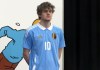 In this grab made from video, a model poses during the unveiling of the new Belgium soccer national team jersey, in Brussels, Belgium, Thursday, March 14, 2024. (SNTV via AP)