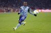 Aston Villa's Moussa Diaby runs after the ball during the Europa Conference League round of 16 first leg soccer match between Ajax and Aston Villa at Johan Cruyff ArenA stadium in Amsterdam, Netherlands, Thursday, March 7, 2024. (AP Photo/Peter Dejong)