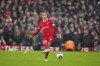 Liverpool's Virgil van Dijk passes the ball during the English Premier League soccer match between Liverpool and Manchester City, at Anfield stadium in Liverpool, England, Sunday, March 10, 2024. The match ended 1-1. (AP Photo/Jon Super)