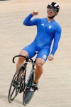 FILE - Greece's Christos Volikakis celebrates after winning the bronze in the men's track cycling sprint event during the European Track Cycling Championships in Panevezys, Lithuania, on Oct. 20, 2012. Four-time Olympic cyclist Christos Volikákis tested positive for doping in retests of samples from the 2016 Rio de Janeiro Games, the International Cycling Union said Friday, March 15, 2024. (AP Photo/Mindaugas Kulbis, File)