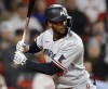 FILE - Minnesota Twins' Michael A. Taylor takes an at-bat during the sixth inning of a baseball game against the Boston Red Sox, April 18, 2023, in Boston. Taylor agreed to a one-year, $4-million deal with the Pittsburgh Pirates, Friday, March 15, 2024, a person with knowledge of the agreement told The Associated Press. The person spoke on condition of anonymity because the deal will not be completed until Taylor passes a physical. (AP Photo/Michael Dwyer, File)