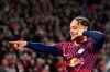 Leipzig's Xavi Simons celebrates scoring during the German Bundesliga soccer match between Leipzig and Cologne, at the RheinEnergieStadion in Cologne, Germany, Friday, March 15, 2024. (Federico Gambarini/dpa via AP)
